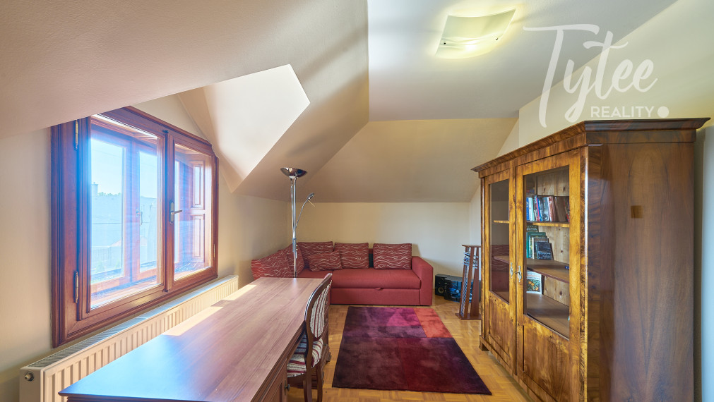 Rodinné sídlo s priestranným ateliérom