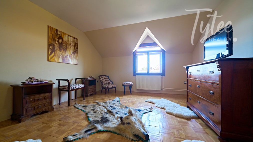 Rodinné sídlo s priestranným ateliérom